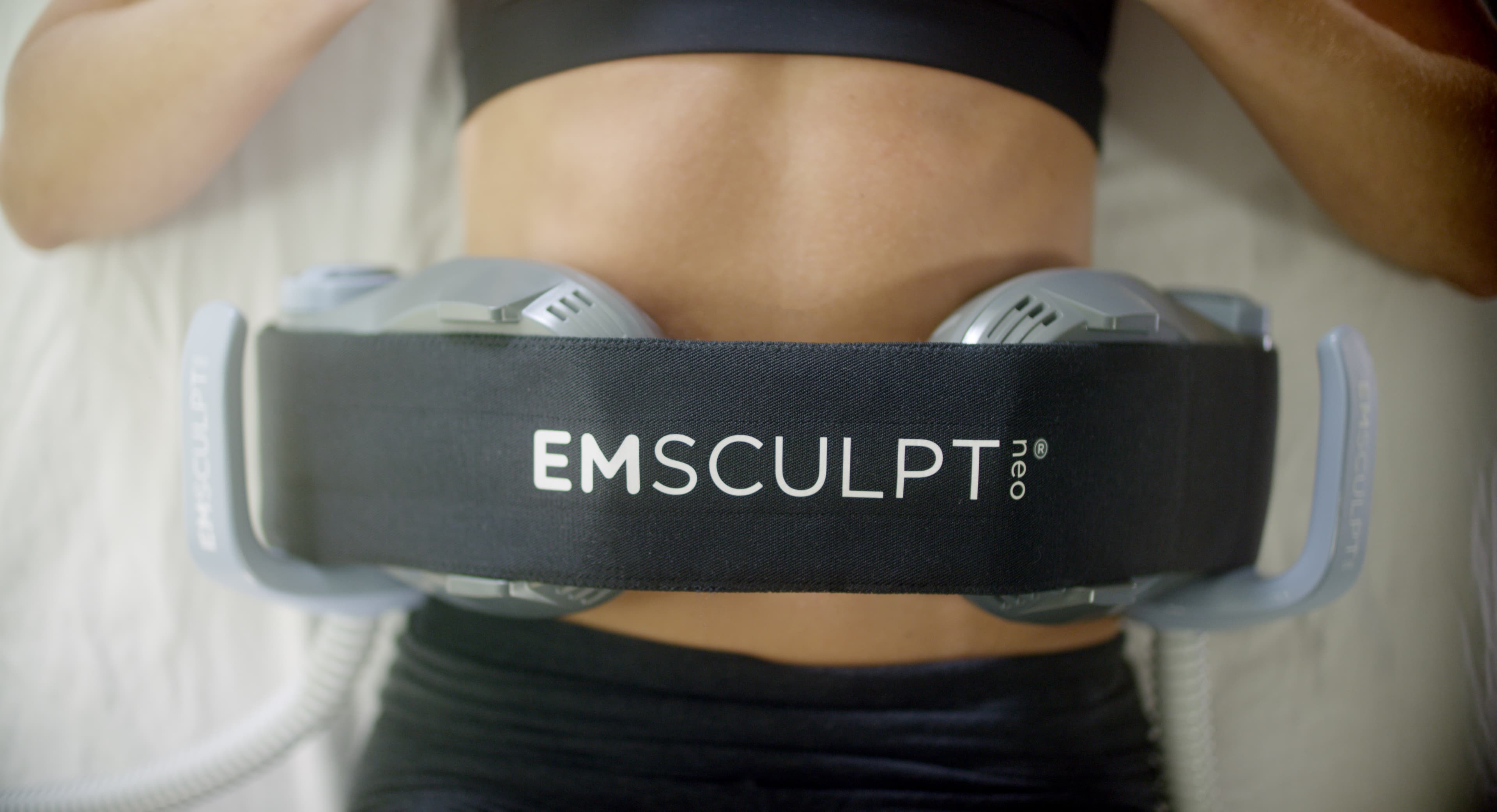 EMSculpt Neo applicator on the abdomen